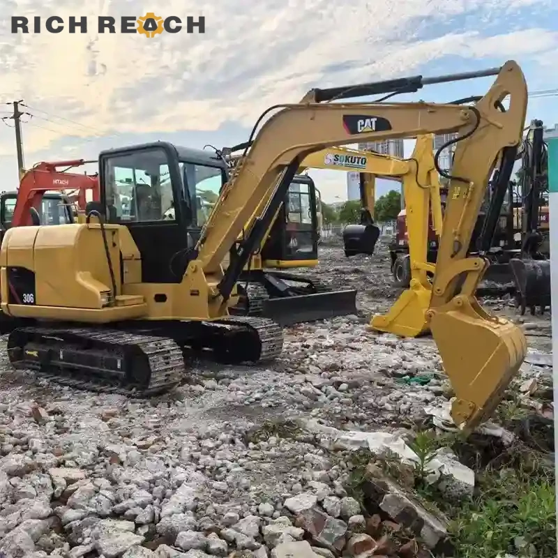 Powerful CAT306 mini excavator loading dump trailer USD sale