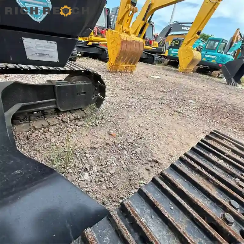 Used Hitachi ZAXIS 120 excavator – arm pin and bushing wear inspection