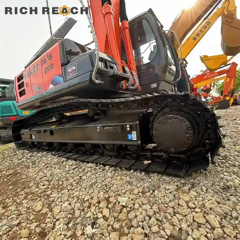 Used Hitachi ZAXIS 200 excavator – arm cylinder rod and grease fittings – excellent condition low hours