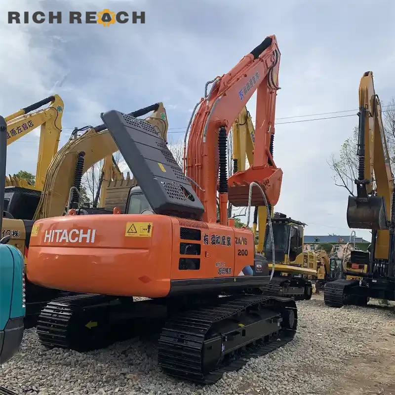 Used Hitachi ZAXIS 200 excavator – bottom rollers and track guard – well maintained undercarriage