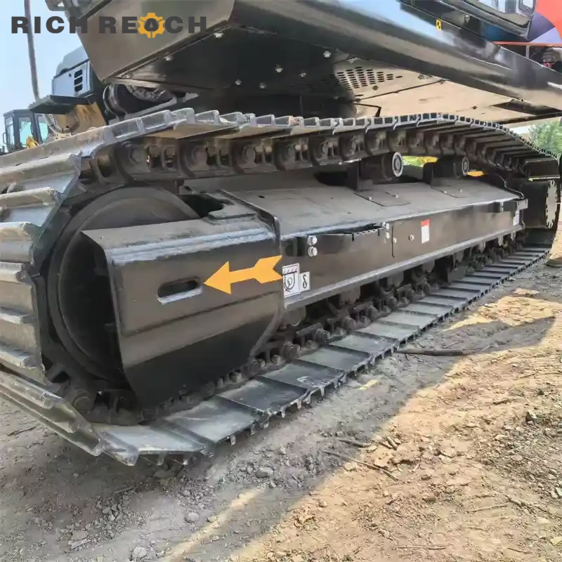 Undercarriage and tracks of a used Hitachi ZAXIS 240 excavator for sale