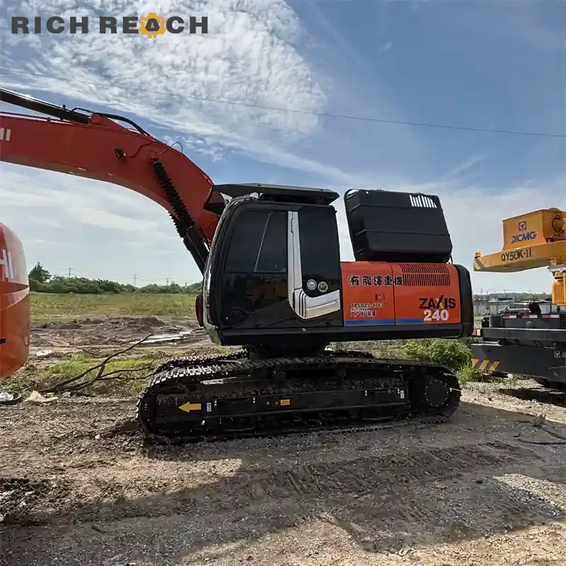 Bucket teeth and side cutters on a used Hitachi ZAXIS 240 excavator