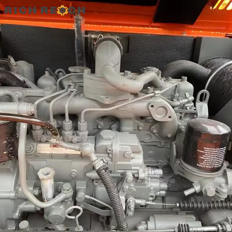 Engine compartment with Yanmar 4TNV engine of a used Hitachi ZAXIS 60 mini excavator, low hours, affordable USD price