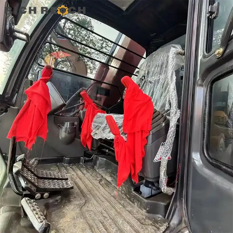 Dozer blade and cutting edge of a used Hitachi ZAXIS 70 excavator, low hour machine