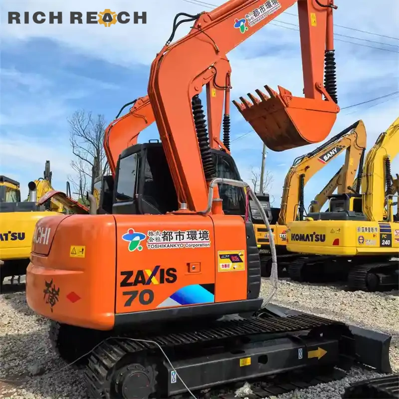 Engine bay air cleaner and filters on a used Hitachi ZAXIS 70 excavator, low hours, priced in USD