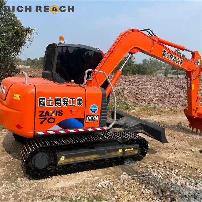Front offset boom on a used Hitachi ZAXIS 70 excavator, ideal for utilities and landscaping, low hours