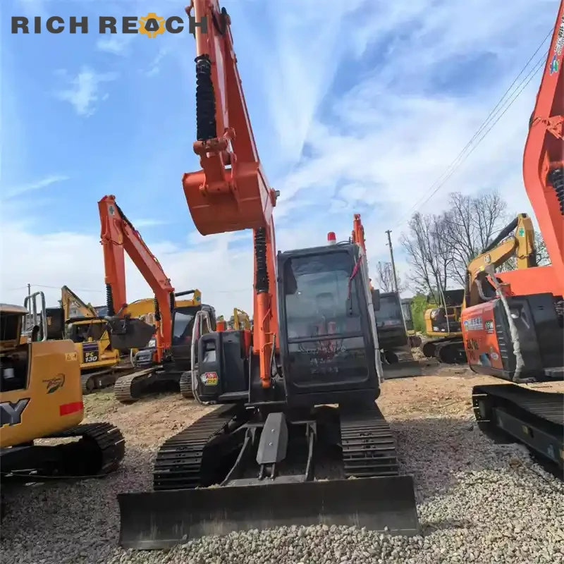 Front three-quarter view of a used Hitachi ZAXIS 70 crawler excavator, low hours, priced in USD