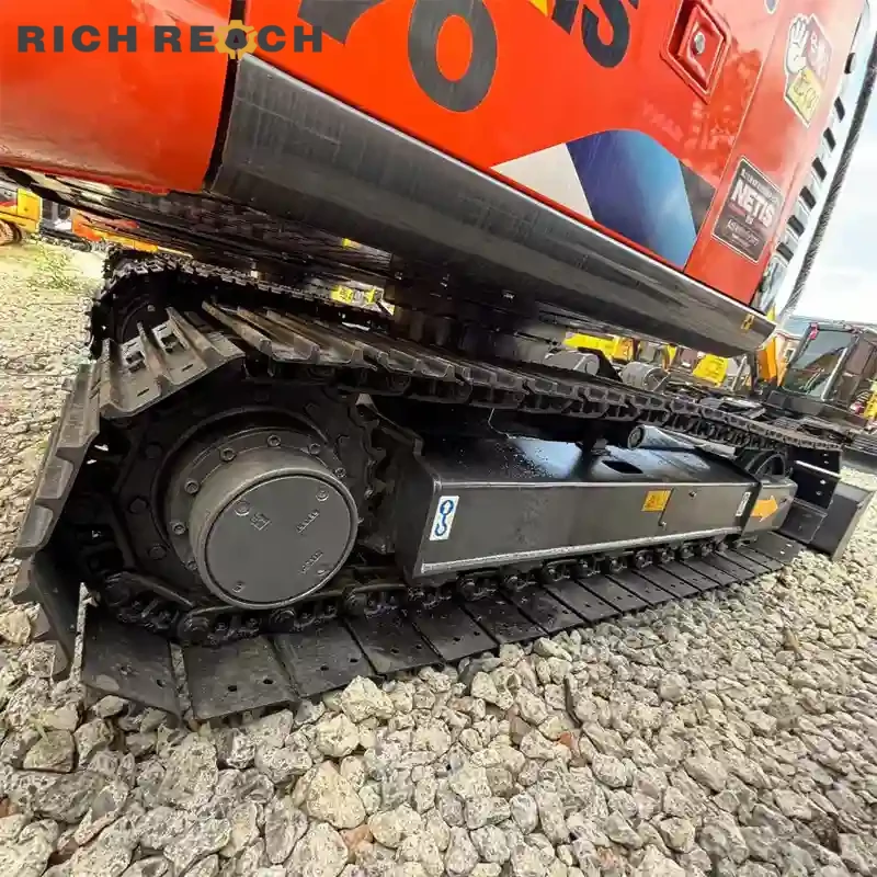 Rear three-quarter view of a used Hitachi ZAXIS 70 crawler excavator, low hours, USD price