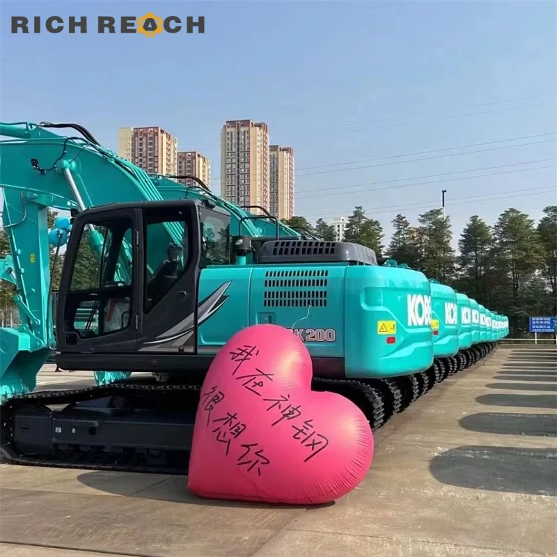 Operator cab interior with joysticks and air suspension seat of used Kobelco 200 excavator