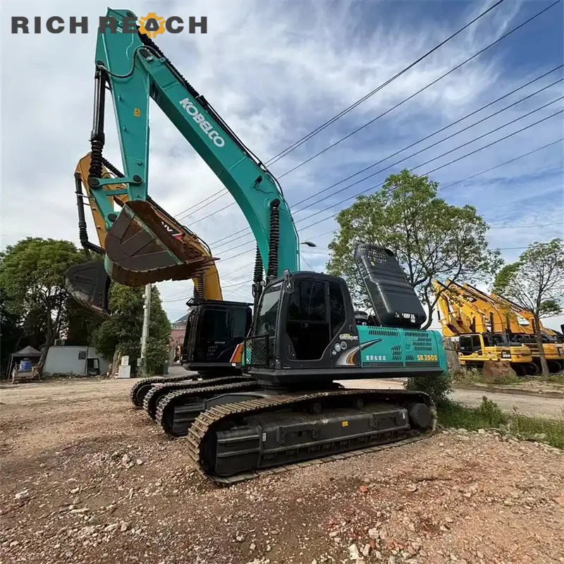 Left side heavy-duty undercarriage of a used Kobelco 350D excavator, low hours, high digging forces, priced in USD for quick sale