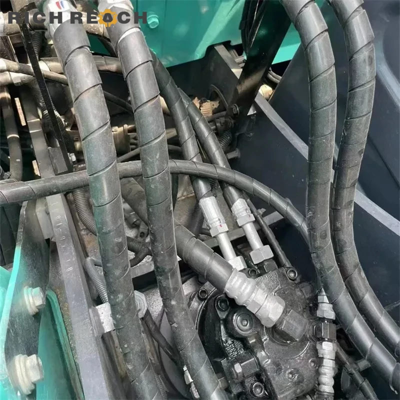 Used Kobelco 75 mini excavator – control panel and throttle, user-friendly cab with original display