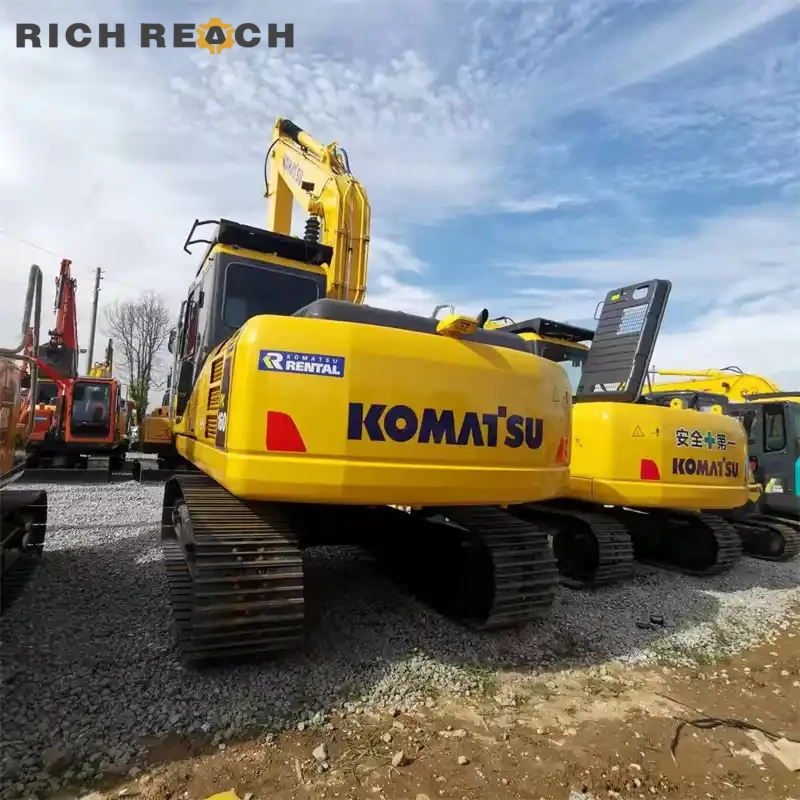 Used Komatsu PC160 left side view showing long track frame, durable undercarriage for sale