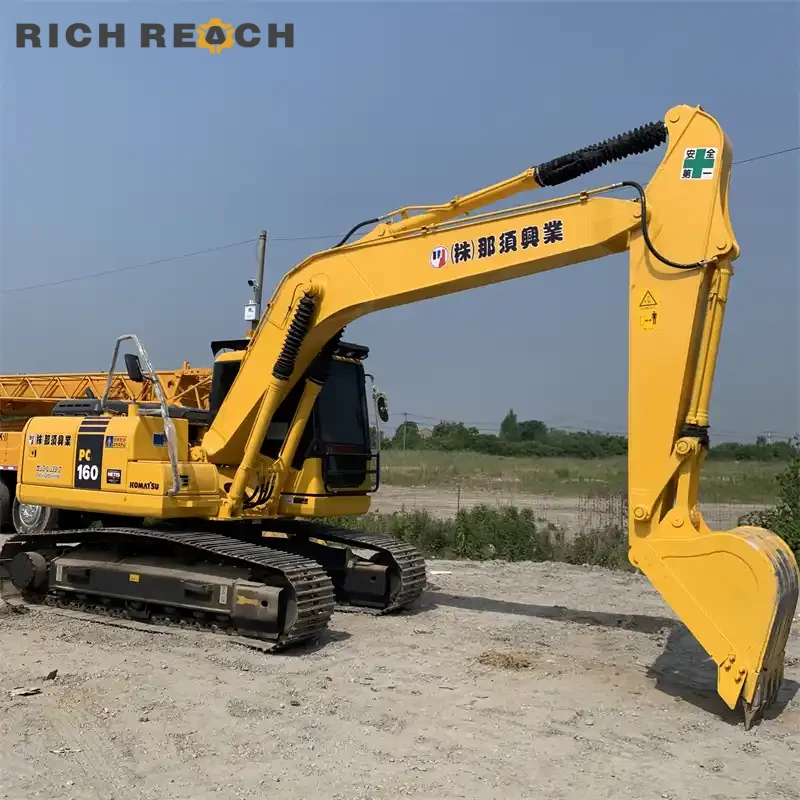 Used Komatsu PC160 right side pump room access, clean hydraulic components, low hours