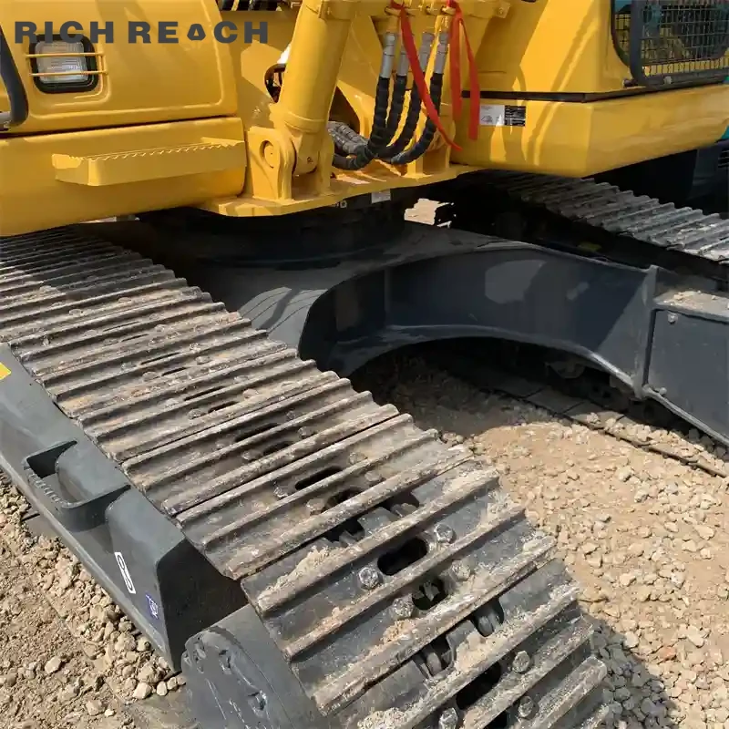 Used Komatsu PC160LC excavator bucket with shroud, heavy-duty design, low hours, USD price