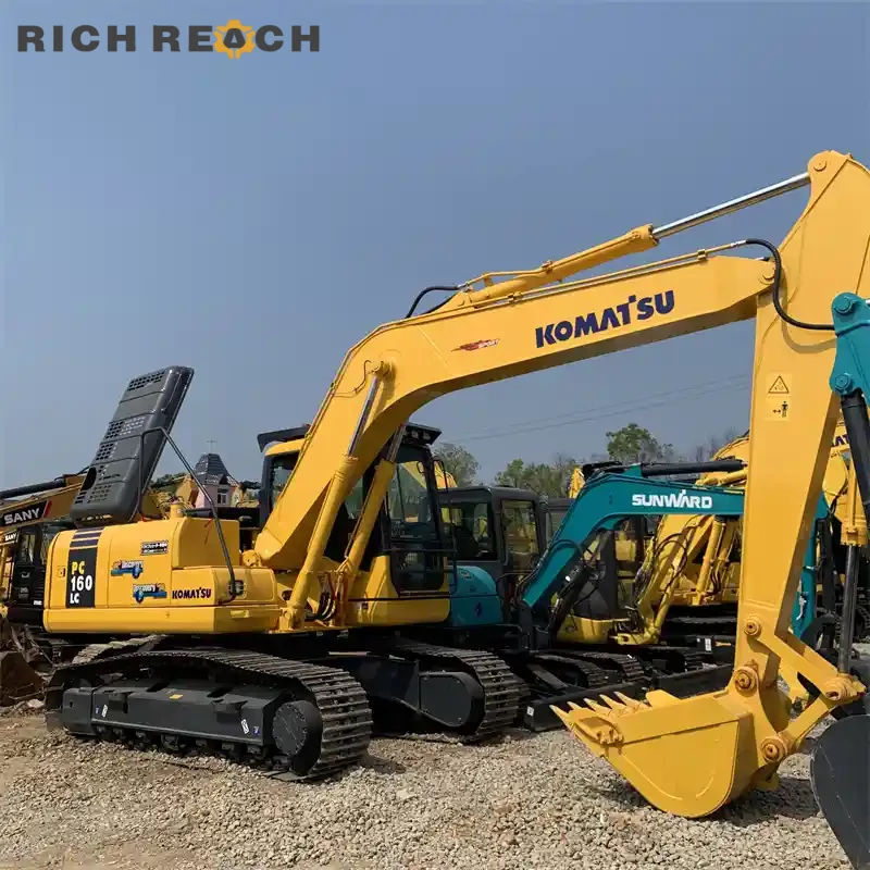 Used Komatsu PC160LC excavator long track frame and front attachment, LC stability, low hours, priced in USD