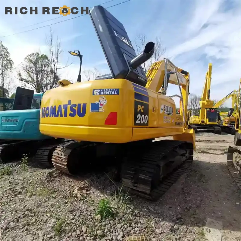 Heavy-duty bucket with teeth on a used Komatsu PC200 excavator