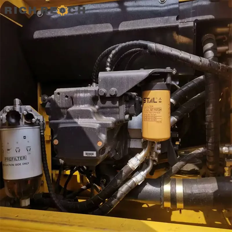 Deluxe suspension seat and armrest controls in a used Komatsu PC200 cab