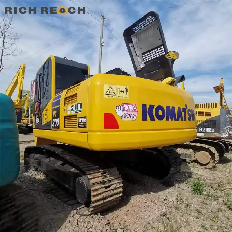 Used Komatsu PC200 excavator performing general earthmoving