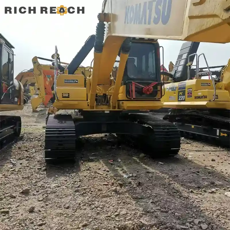 Monitor and eco gauge of a used Komatsu PC220 excavator for sale