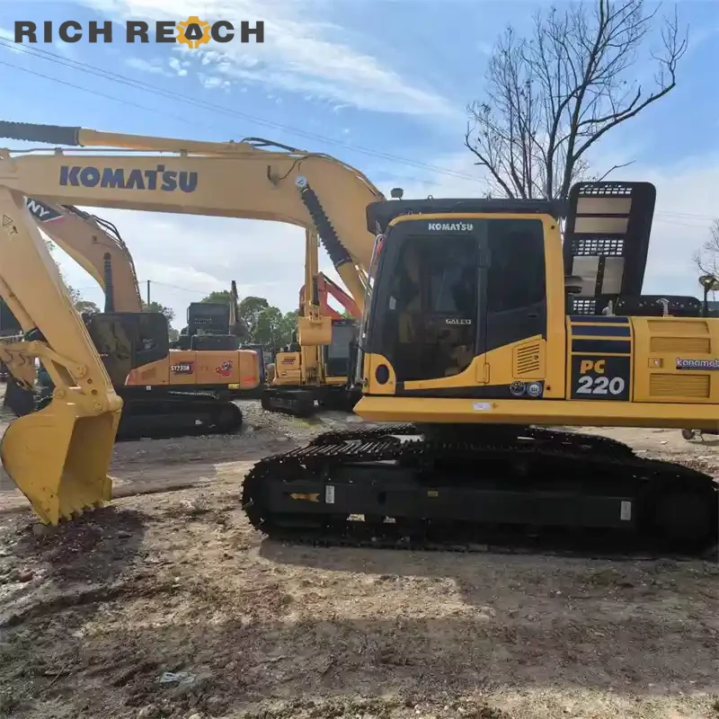 Night operation with working lights on a used Komatsu PC220 excavator