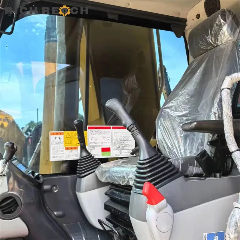 Engine compartment of a Komatsu PC240 excavator featuring Komatsu SAA6D107E-1 efficient diesel engine