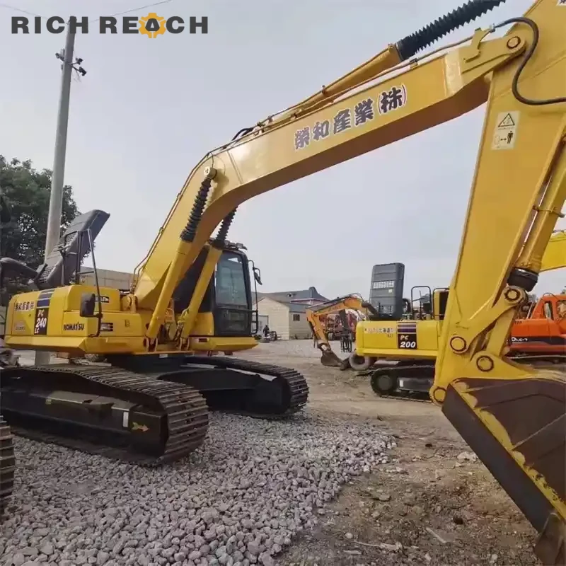 Bucket teeth and side cutters of a used Komatsu PC240LC excavator with low hours and long undercarriage
