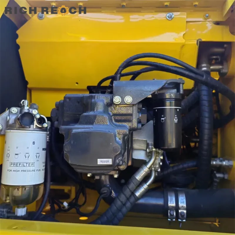 Fuel tank cap and sight glass on a used Komatsu PC240LC excavator