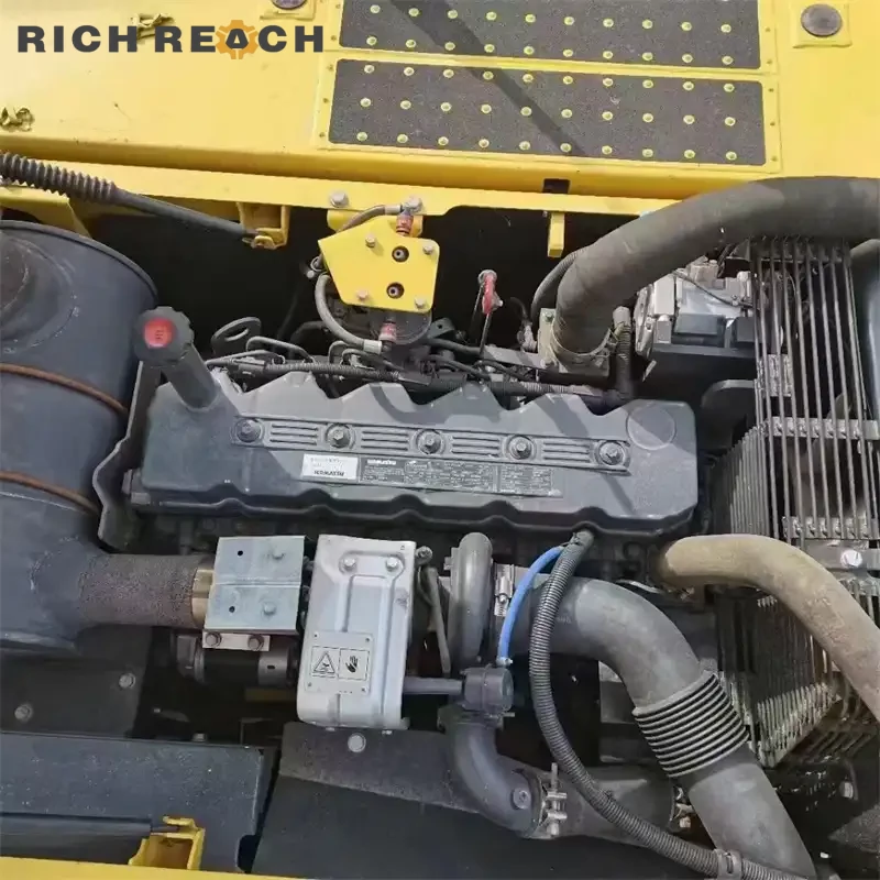 Left side view with boom lowered on a used Komatsu PC240LC excavator