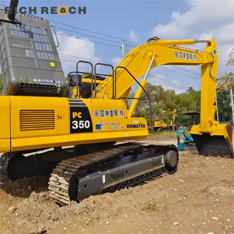 Massive front boom and arm of a used Komatsu PC350 excavator for sale