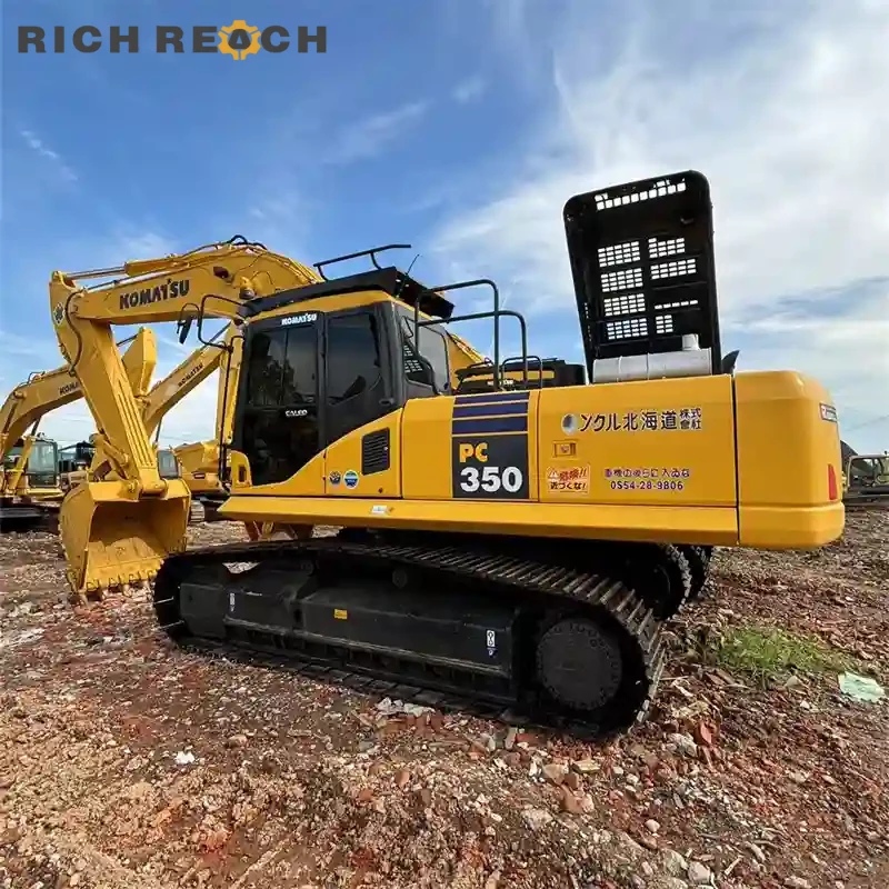 Track adjuster and idler wheel of a used Komatsu PC350 excavator for sale