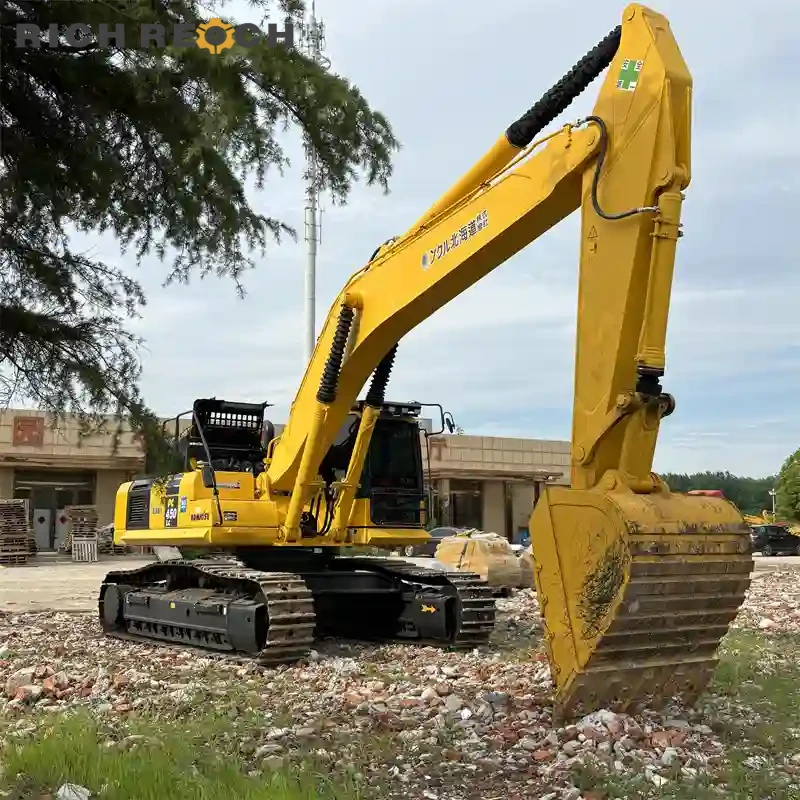 Spacious cab with large LCD monitor and ergonomic controls – used Komatsu PC450LC excavator, operator comfort and machine diagnostics