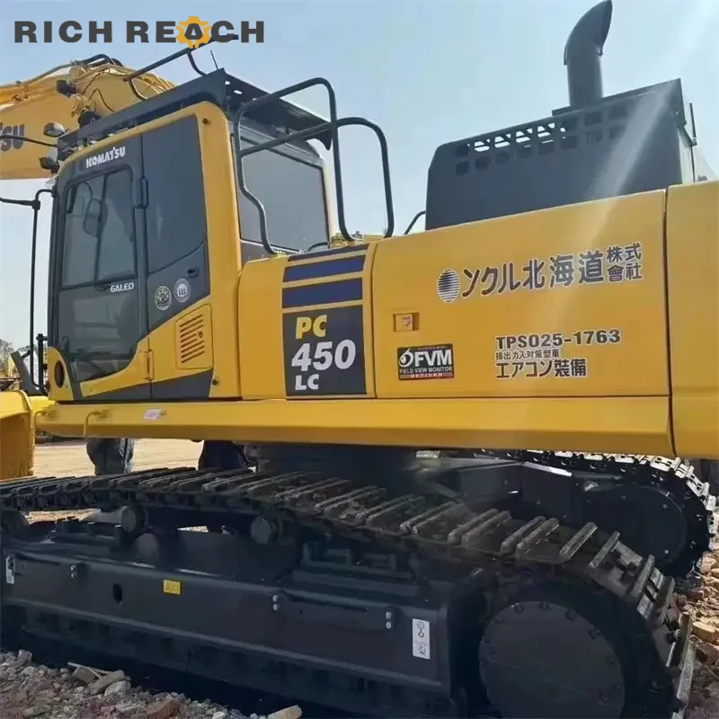 Left side view with extended frame and reinforced track pads – used Komatsu PC450LC for sale, excellent undercarriage condition