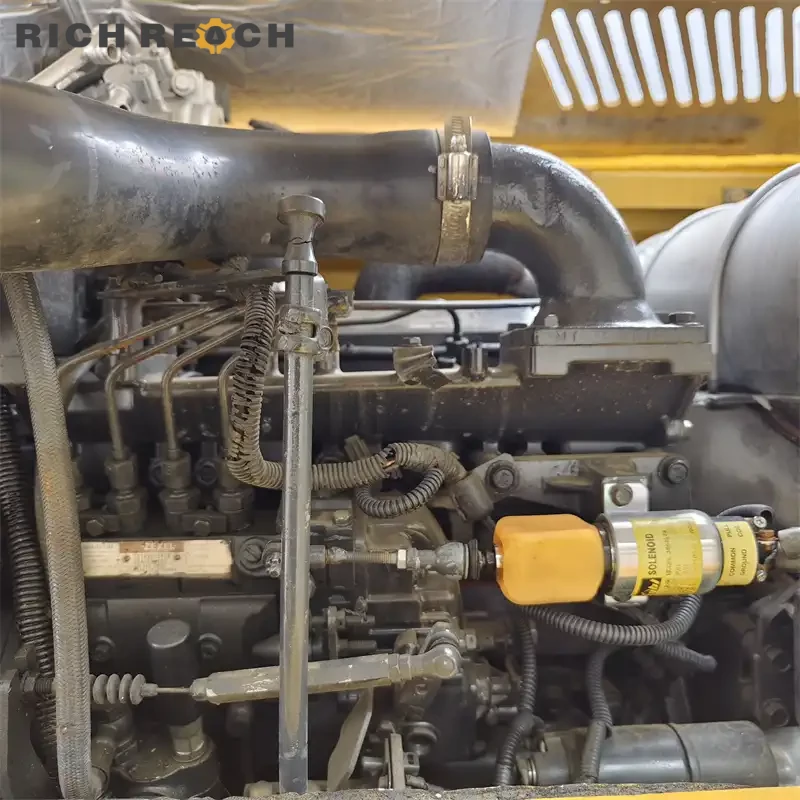 Undercarriage and rubber tracks of a used Komatsu PC60 excavator – low hours, reliable performance
