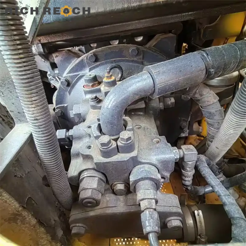 Right side control valve and hydraulic components of a used Komatsu PC60 excavator