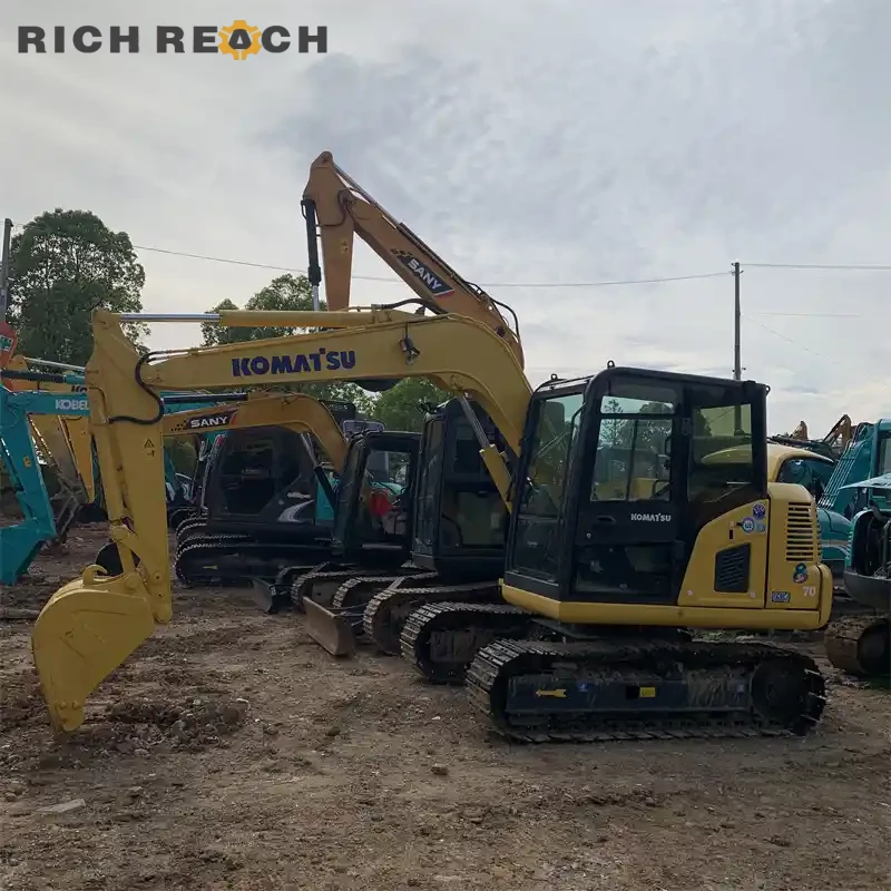 Front three-quarter view of a used Komatsu PC70 mini excavator for sale