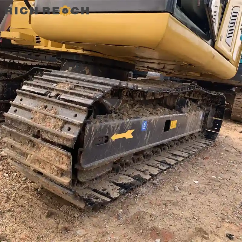Left side with steel tracks of a used Komatsu PC70 mini excavator for sale