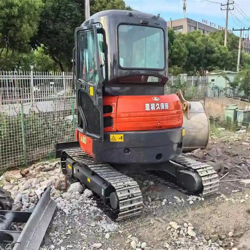 Right side control valve access of a used Kubota 30 mini excavator – hydraulic system inspection view
