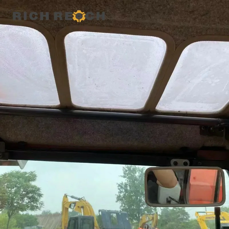 Analog gauges and warning lights of a used Kubota 185-3 excavator