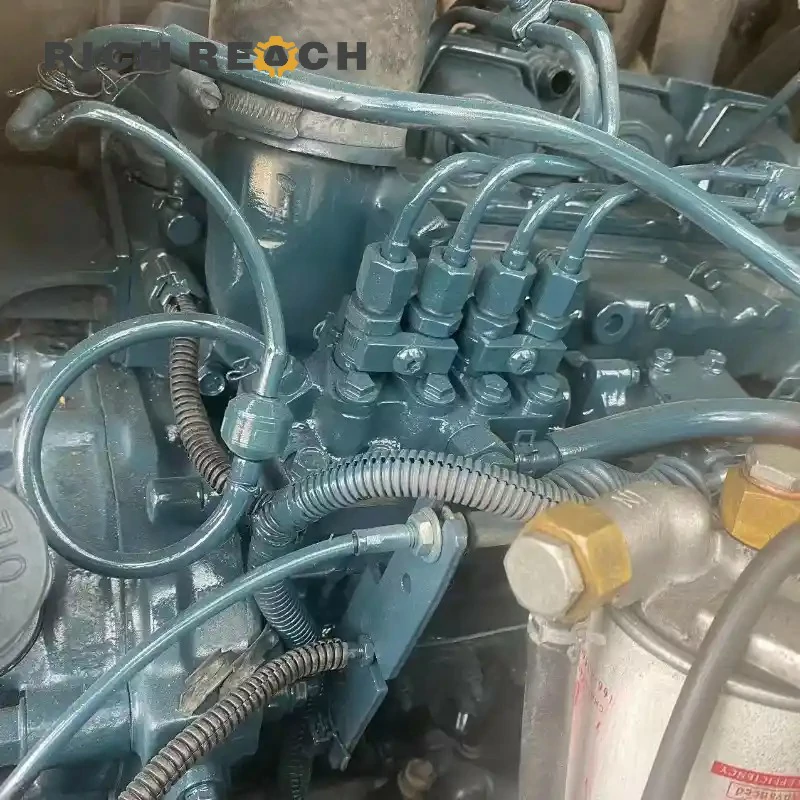 Cab interior with seat and joysticks of a used Kubota 185-3 excavator
