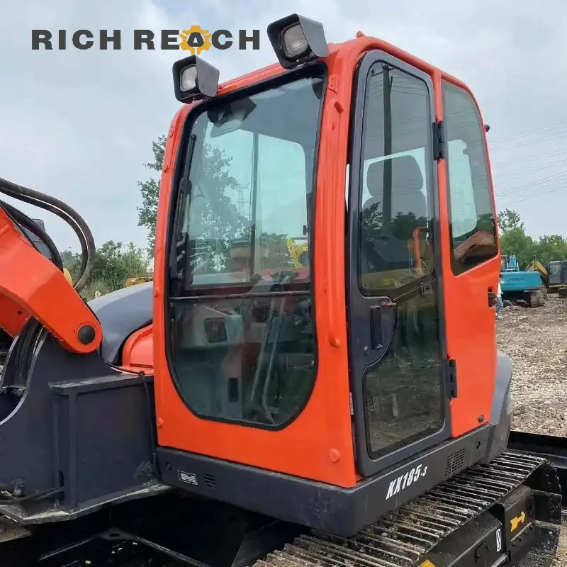 Used Kubota 185-3 excavator digging a building foundation