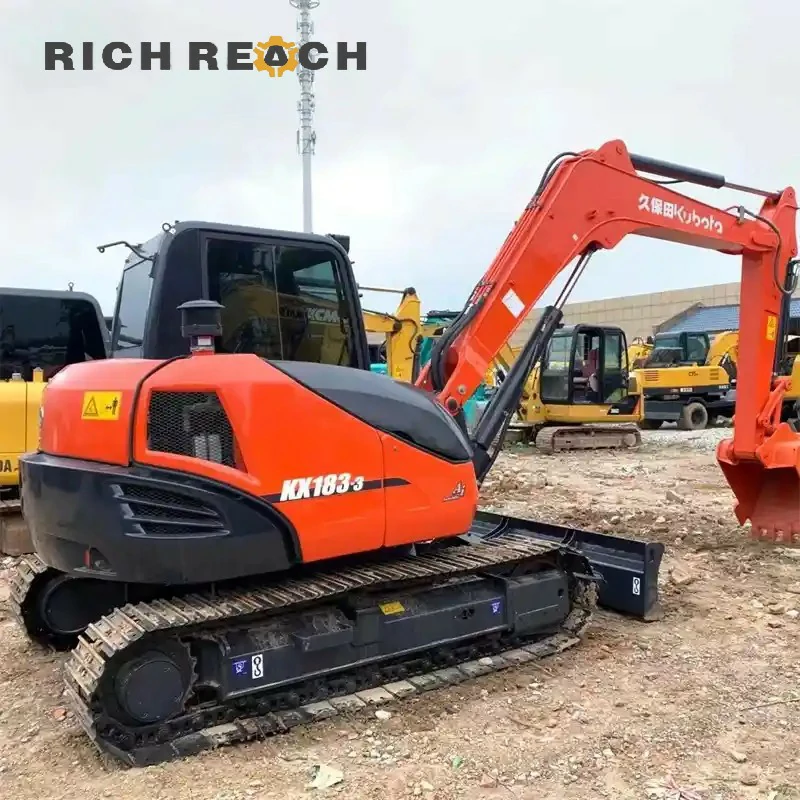 Used Kubota 183-3 U48-4 excavator action shot digging trench with powerful hydraulics