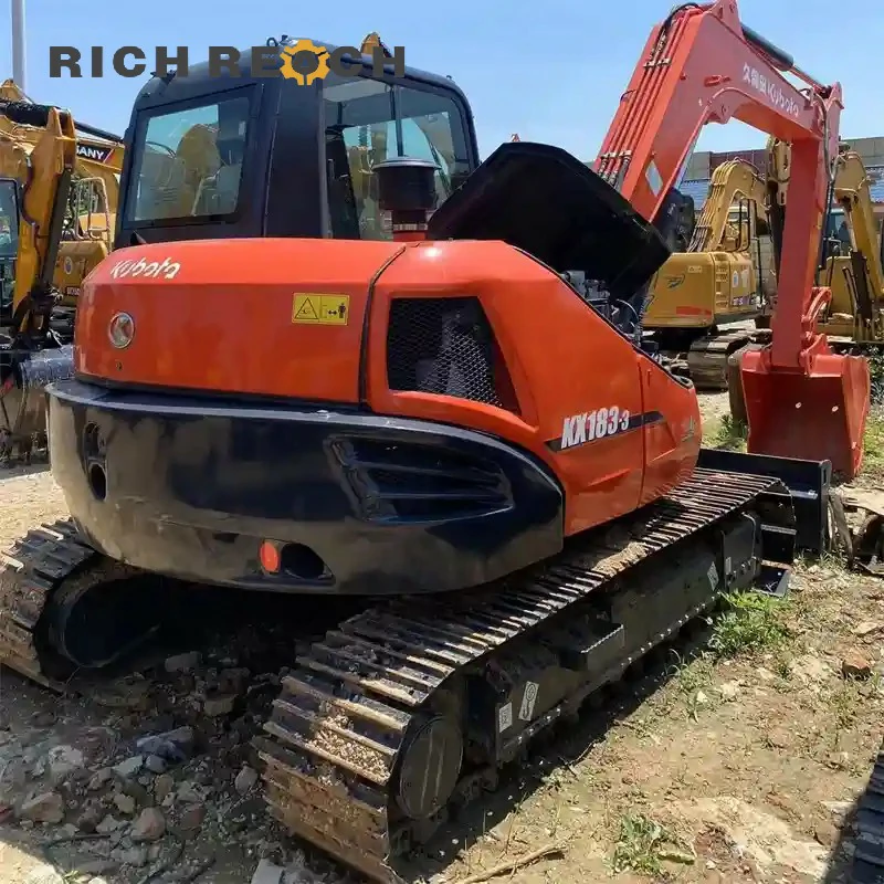Blade cutting edge and wear strip on second-hand Kubota U48-4 excavator