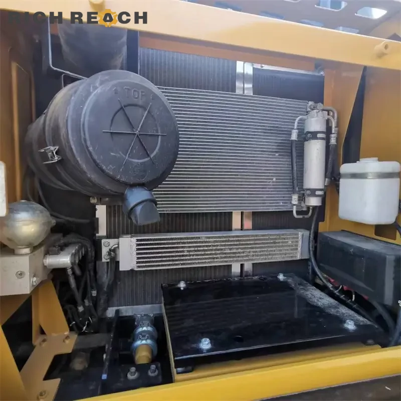 Engine compartment of a used Sany 125C excavator for sale – fuel-efficient Isuzu 4JJ1 engine, easily serviced
