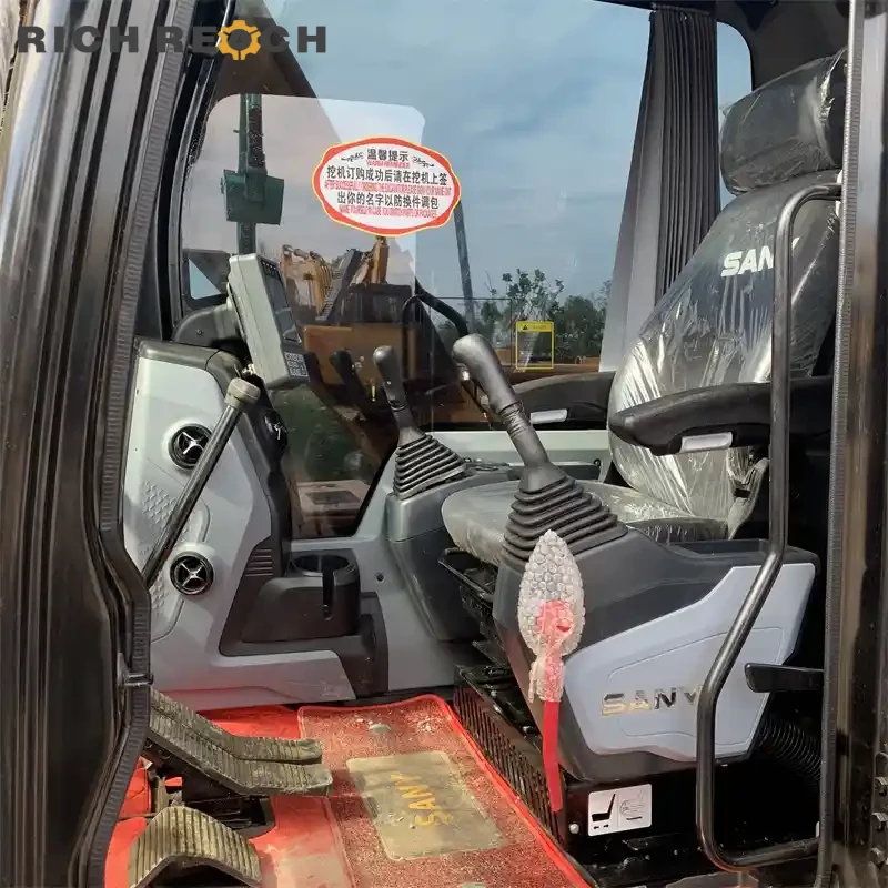 Bucket linkage and wear plates on a used Sany 135C excavator