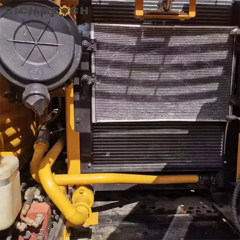 Cab interior, seat, and joysticks of a used Sany 135C excavator
