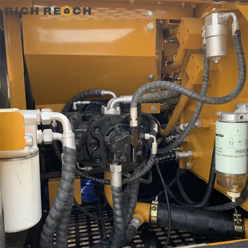 Exhaust stack and muffler on a used Sany 135C excavator