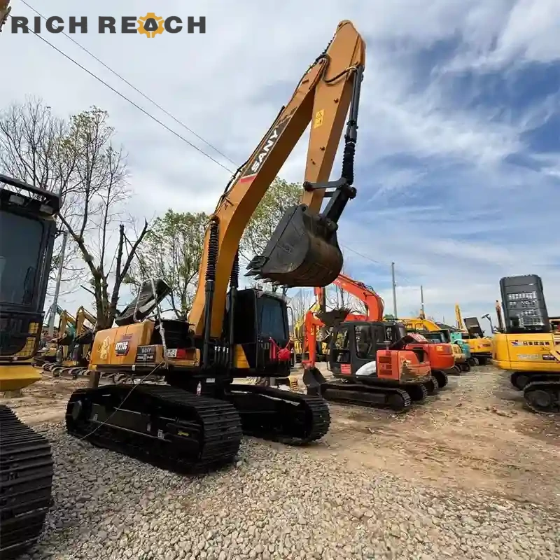 Sany 155C excavator loading a dump truck at job site, used machine in action