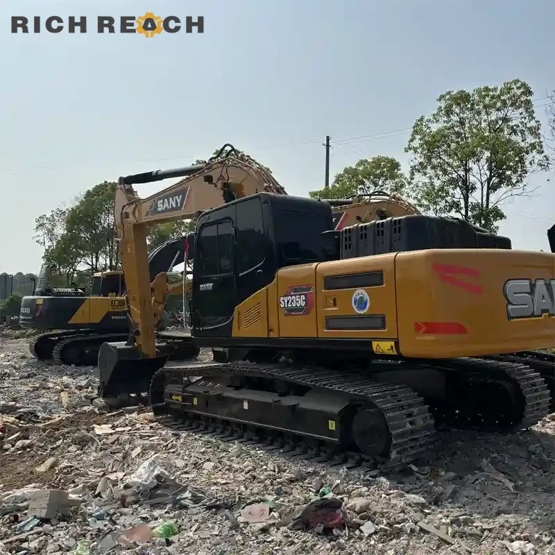 Spacious cab interior with air suspension seat and original monitor – used Sany 235C, low hours, high efficiency, priced in USD