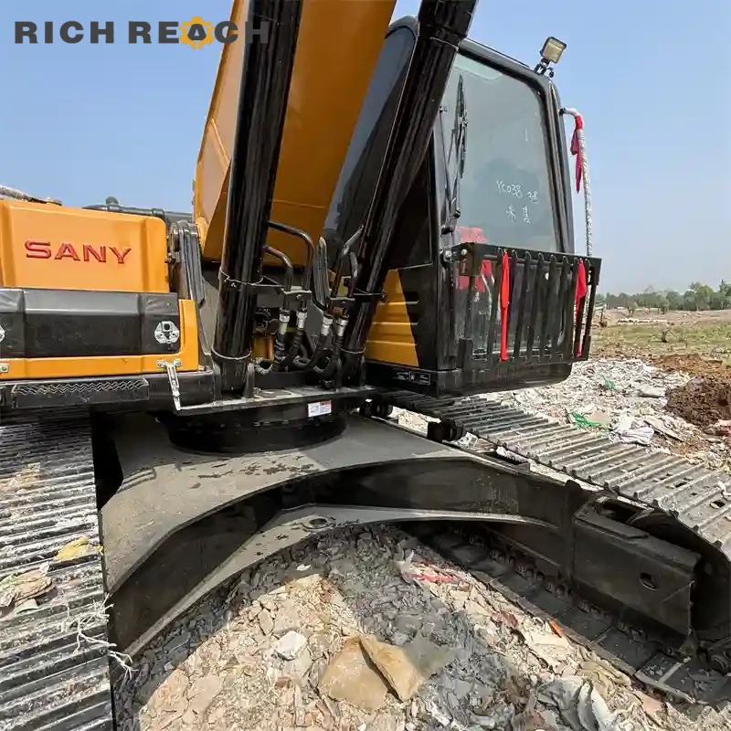 Action shot: used Sany 235C excavator stockpile loading, low hours, high productivity, priced in USD – contact for best offer