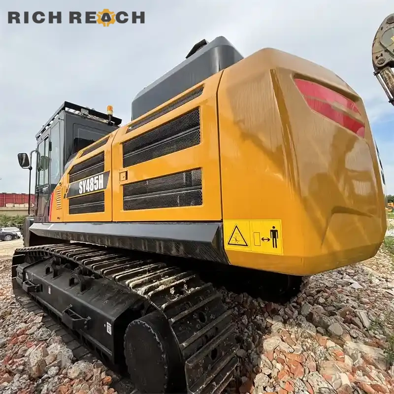 Left side view, long undercarriage of a used Sany 485H excavator, low hours, ready for export in USD